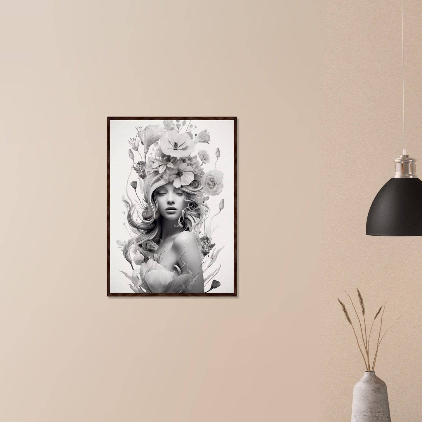 Framed black and white portrait of a woman with floral elements in her hair and surrounding her face.
