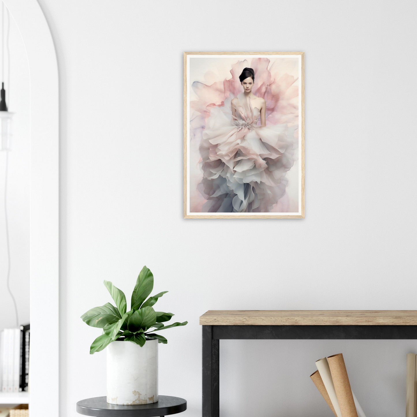 Framed artwork depicting a figure in flowing, ethereal fabric with pink and blue hues.
