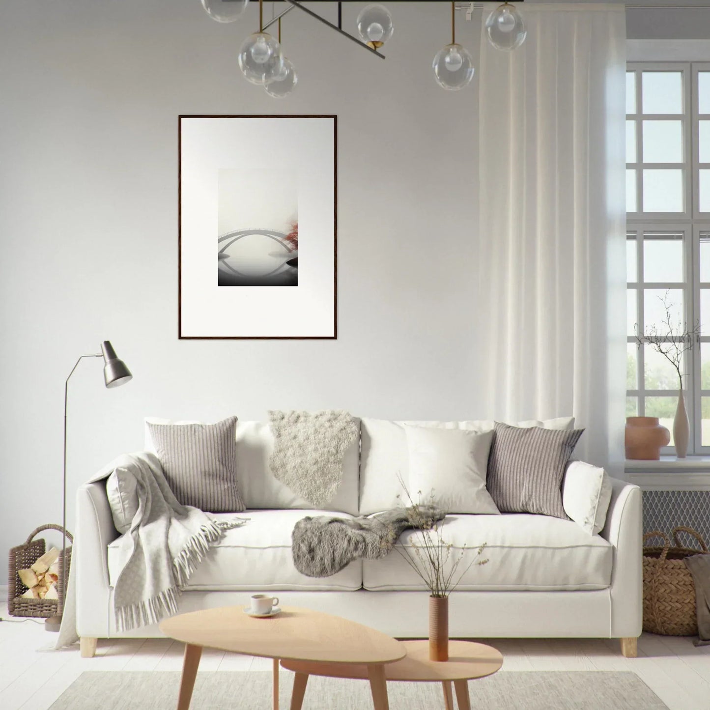 White sofa adorned with throw pillows and blankets, enhancing room decor with bridge reflection