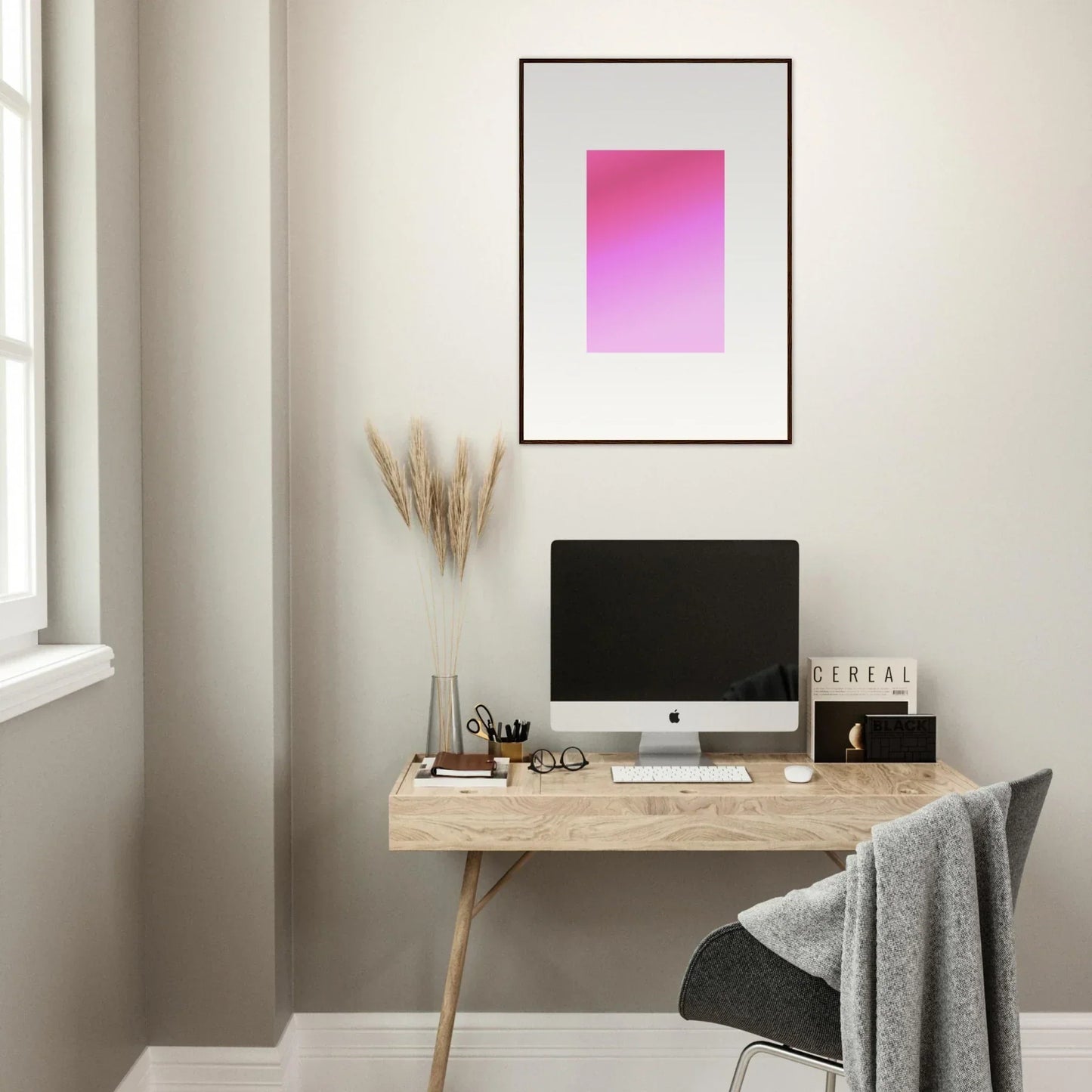 Minimalist workspace featuring an iMac on a Cerise Dream Surface wooden desk