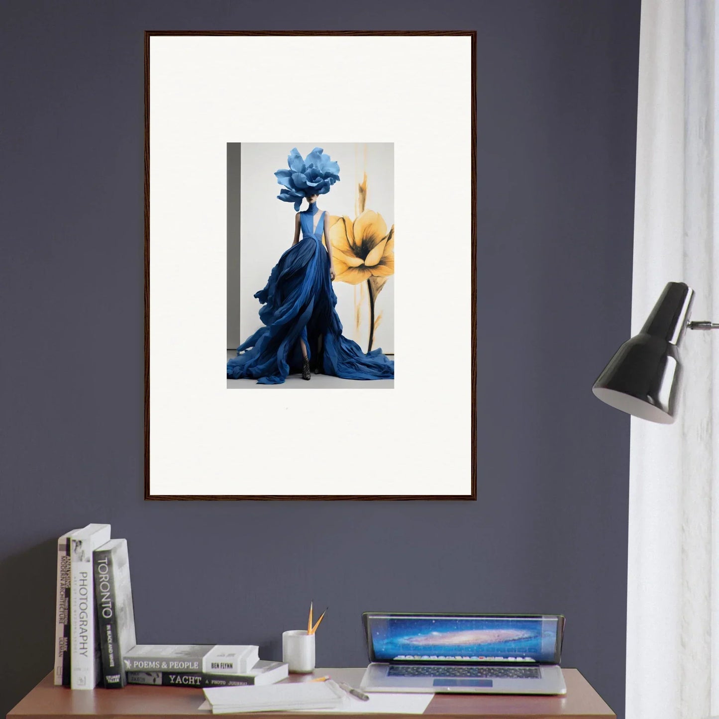 Framed wall art of a figure in blue fabric and a yellow flower from Cerulean Bloom Envoy