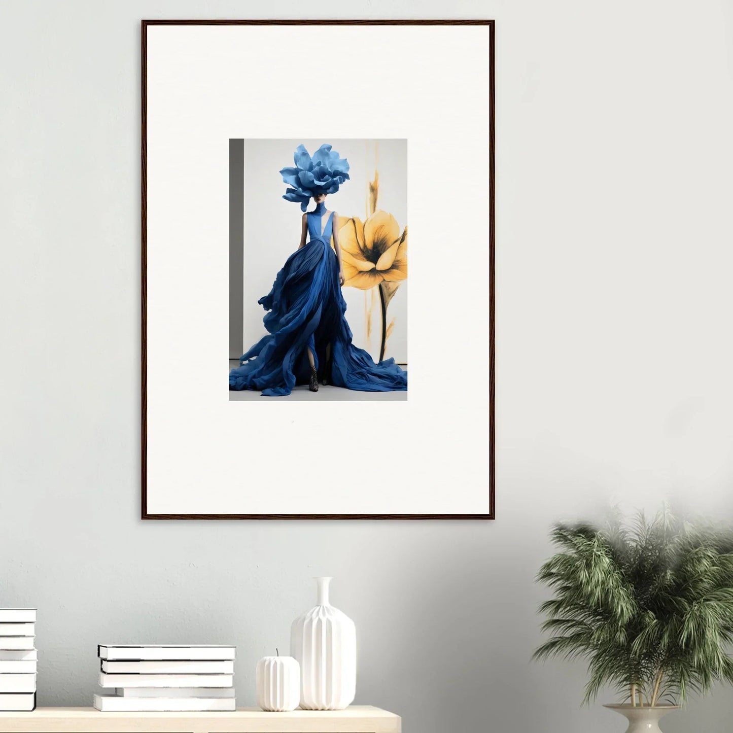 Framed wall art of Cerulean Bloom Envoy features a blue dress and yellow flower accent