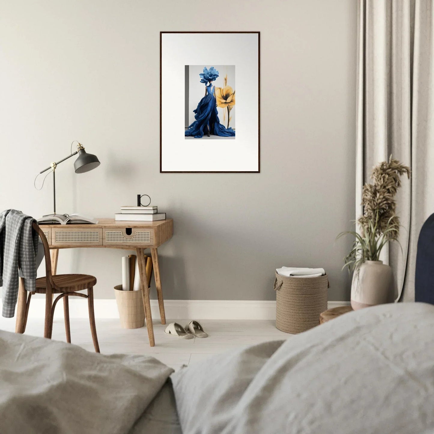 Framed wall art of a blue and yellow abstract figure from Cerulean Bloom Envoy