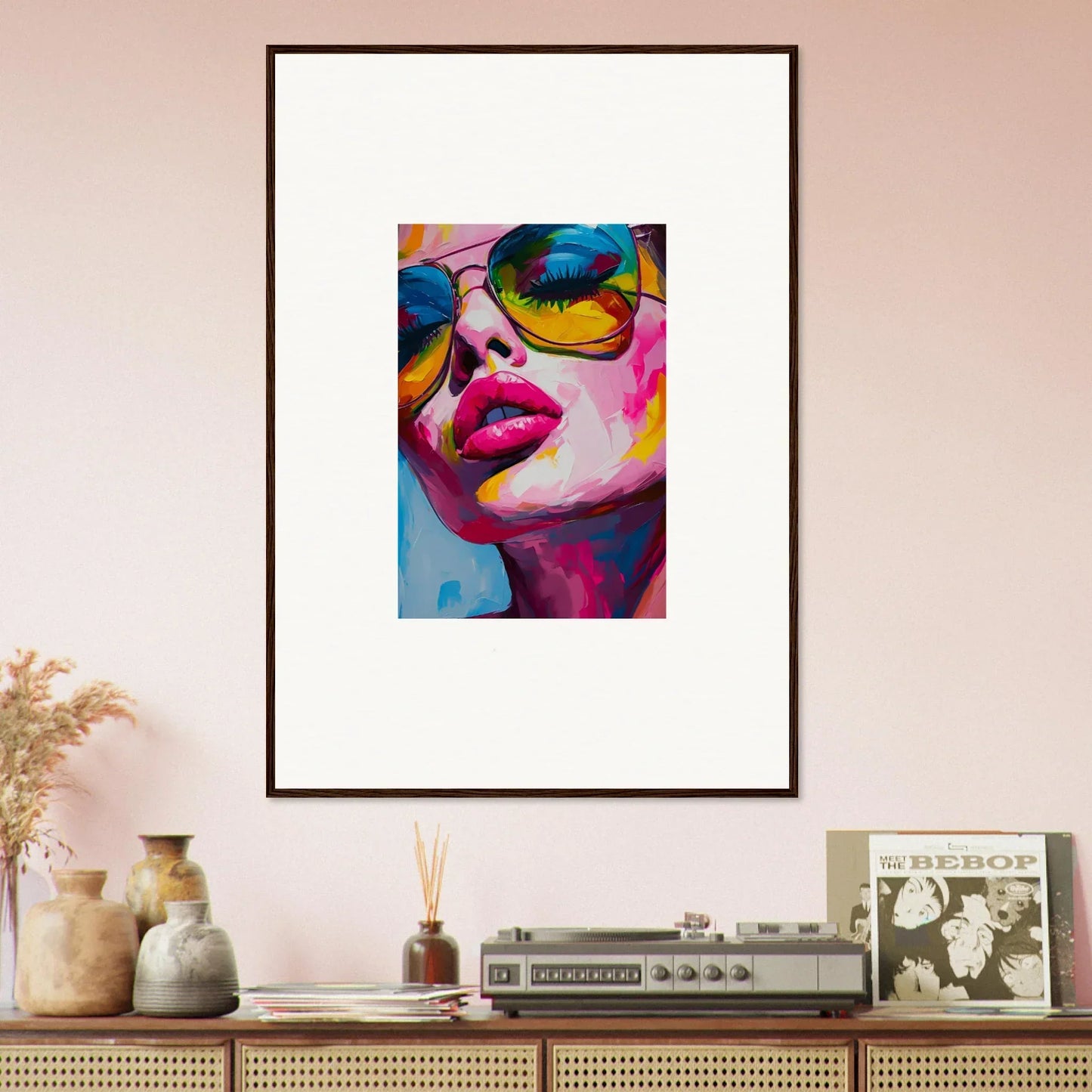 Framed wall art of a vibrant portrait with sunglasses and pink lips for room decor