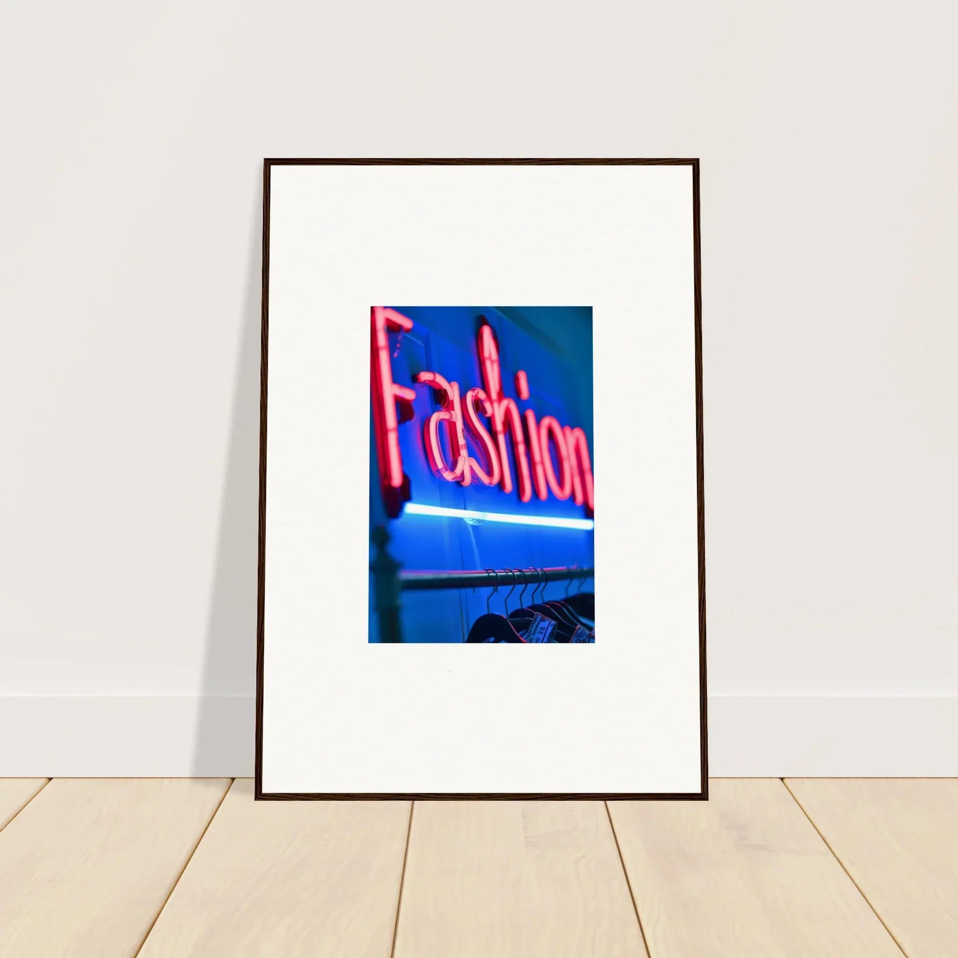 Framed wall art of a neon Fashion sign on a blue background for stylish room decor
