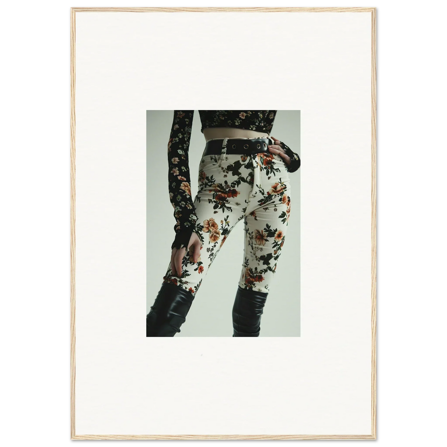 Floral-patterned pants or trousers worn by a person, visible from waist to knees.