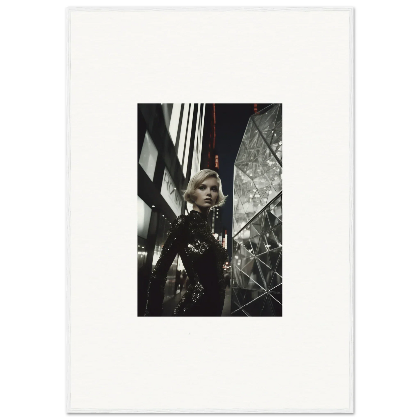 Black and white photograph of a woman in a mirrored setting for stylish room decor