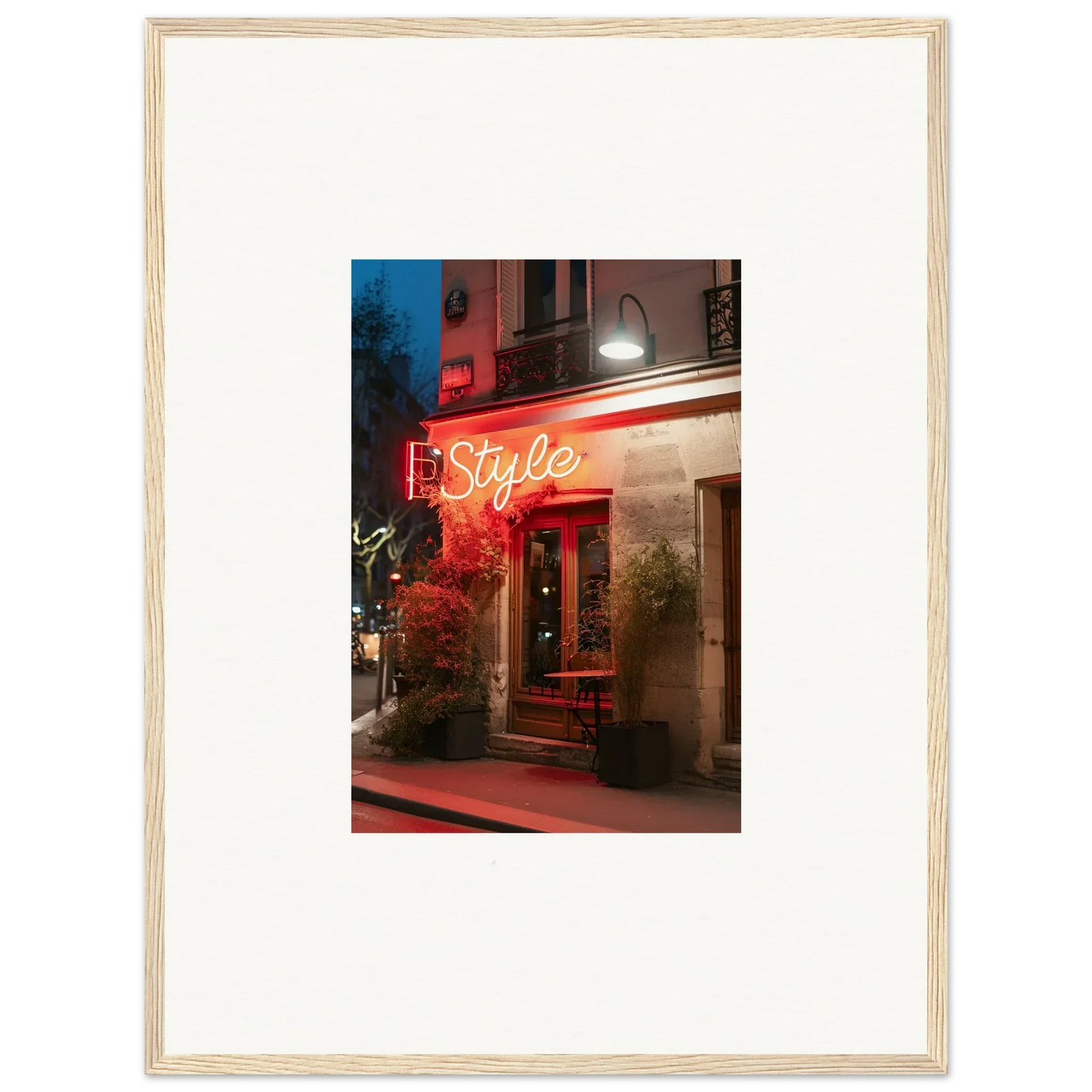 Framed canvas print of a restaurant storefront with neon Style sign and pavement glow