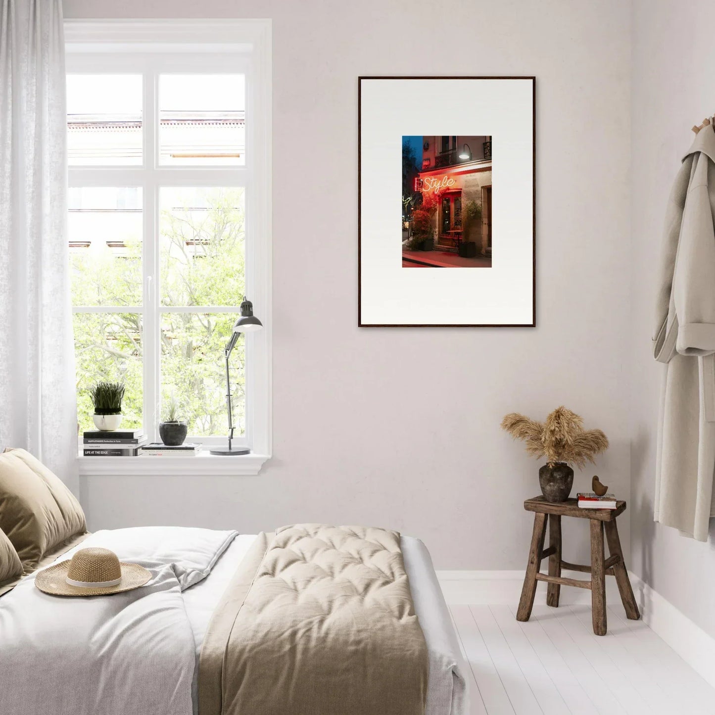 Cozy bedroom with white bedding, canvas print, and sunlight for perfect room decoration