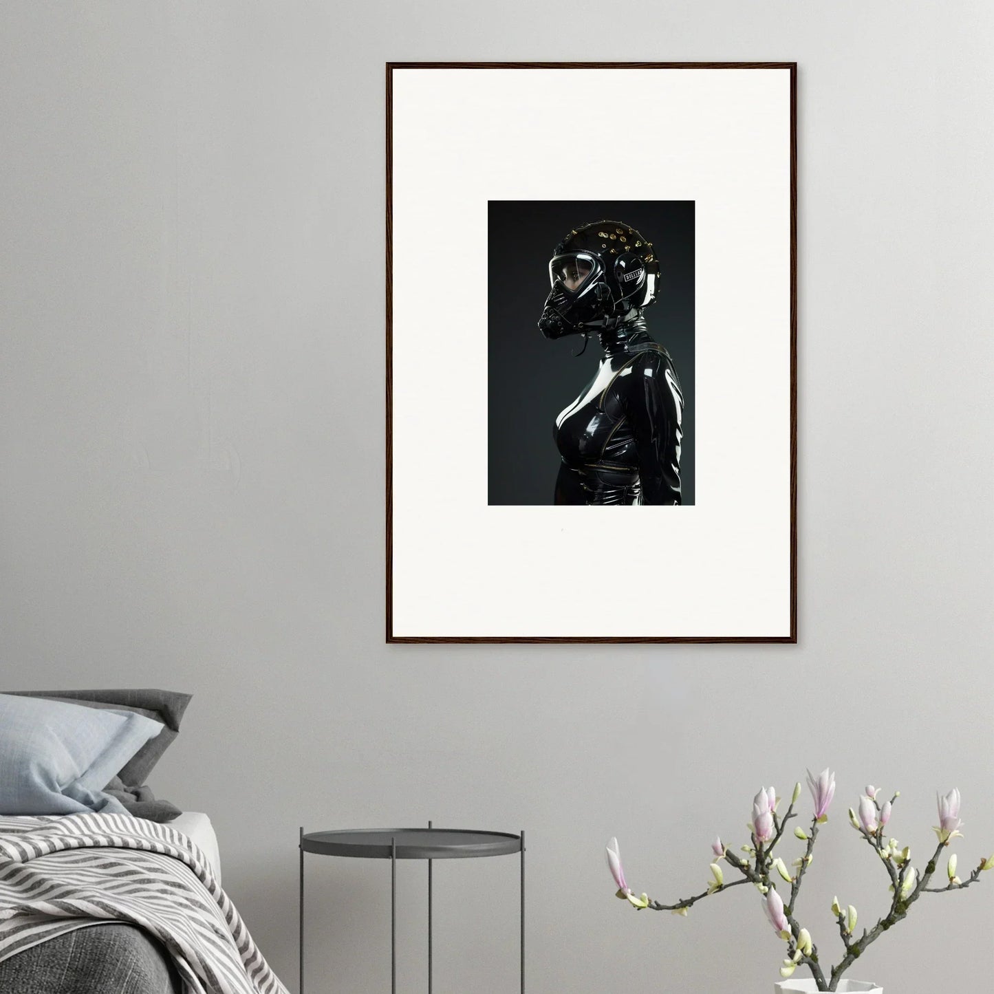 Framed black and white photograph of a figure wearing a gas mask and dark clothing.