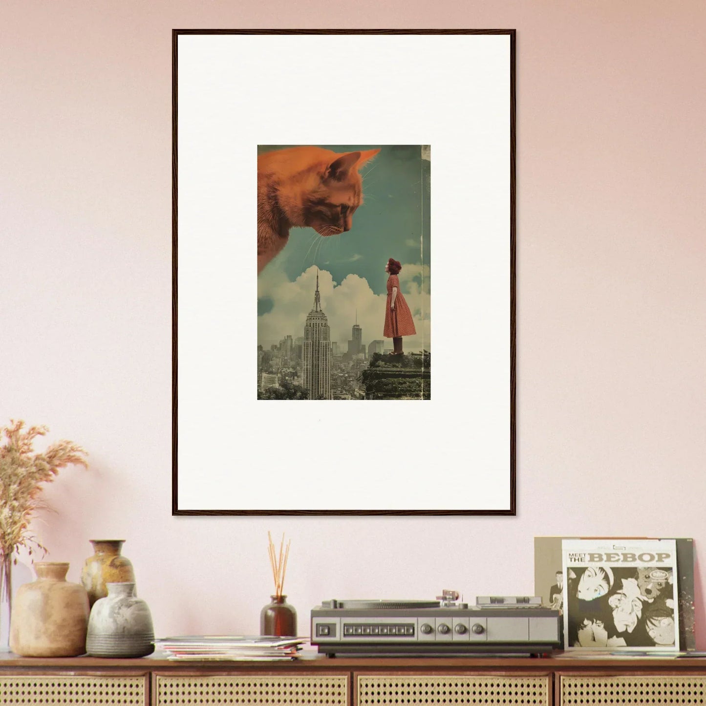 Framed surrealist artwork of a giant cat head over a cityscape for whimsical room decor