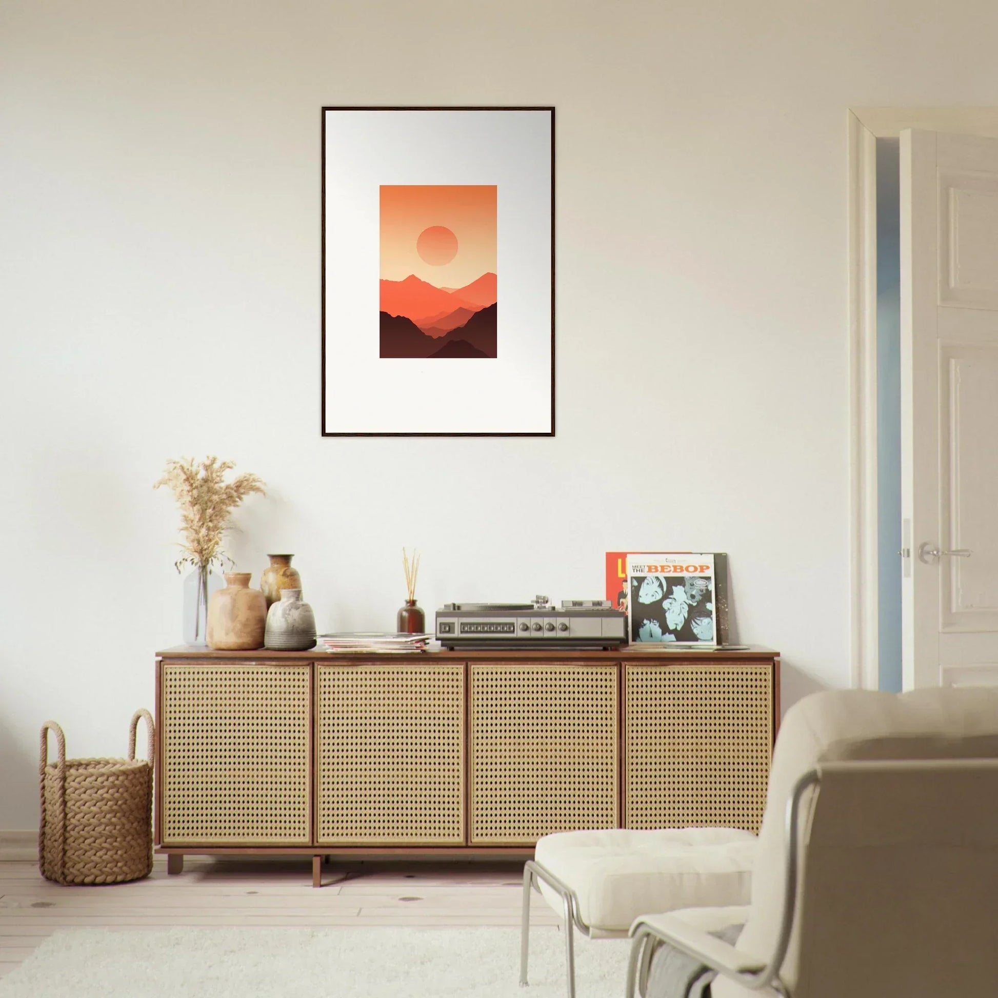 Framed wall art of Monarch Glow sunset landscape on a white wall for stylish room decor