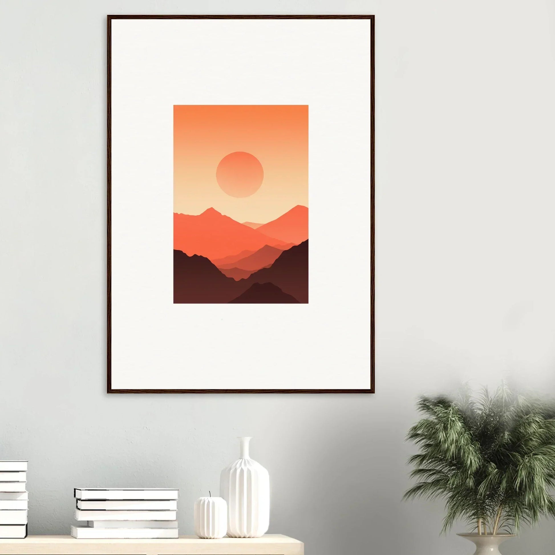 Framed wall art of a sunset over mountains in warm tones, perfect for room decor