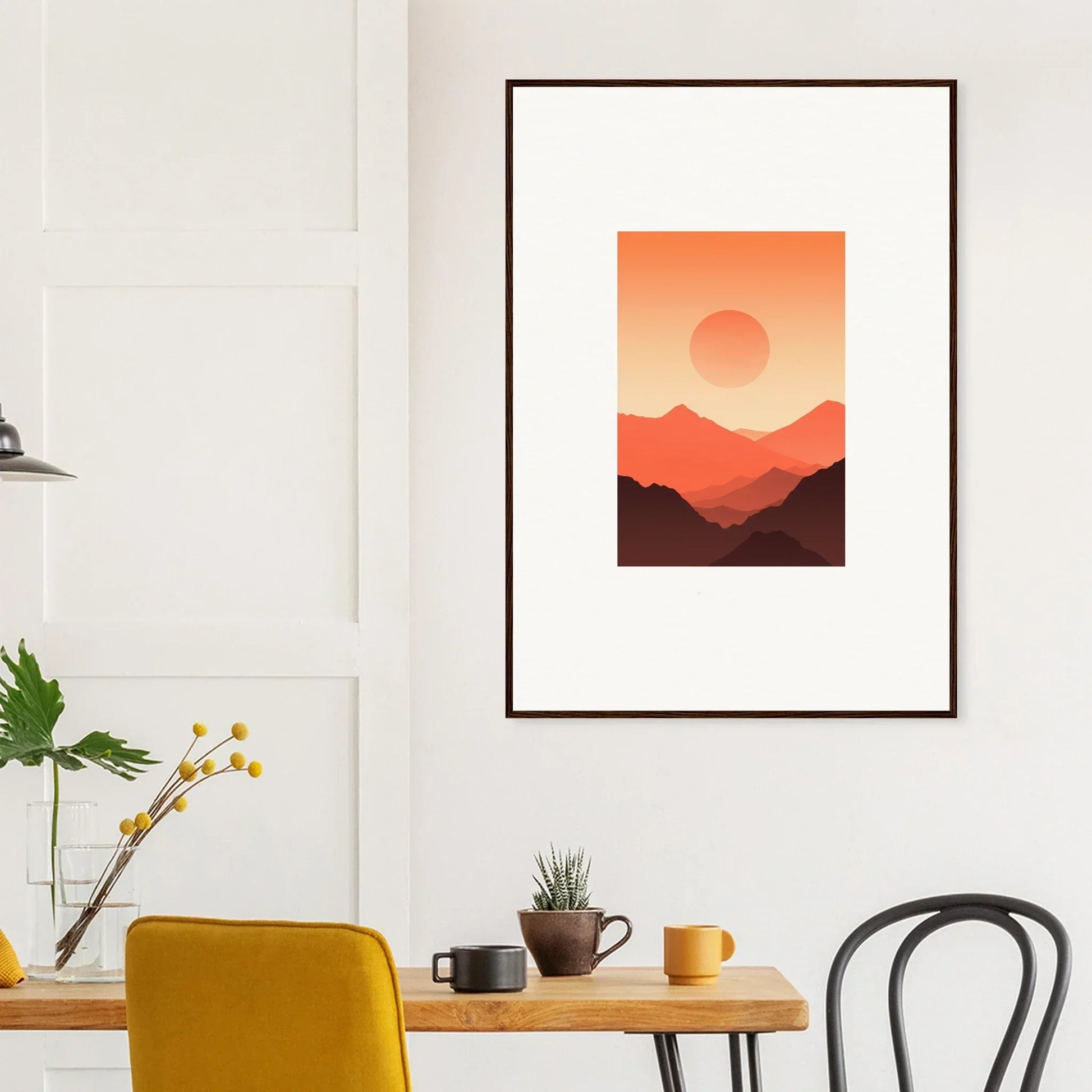 Framed wall art of a sunset over mountains in warm tones for elegant room decor
