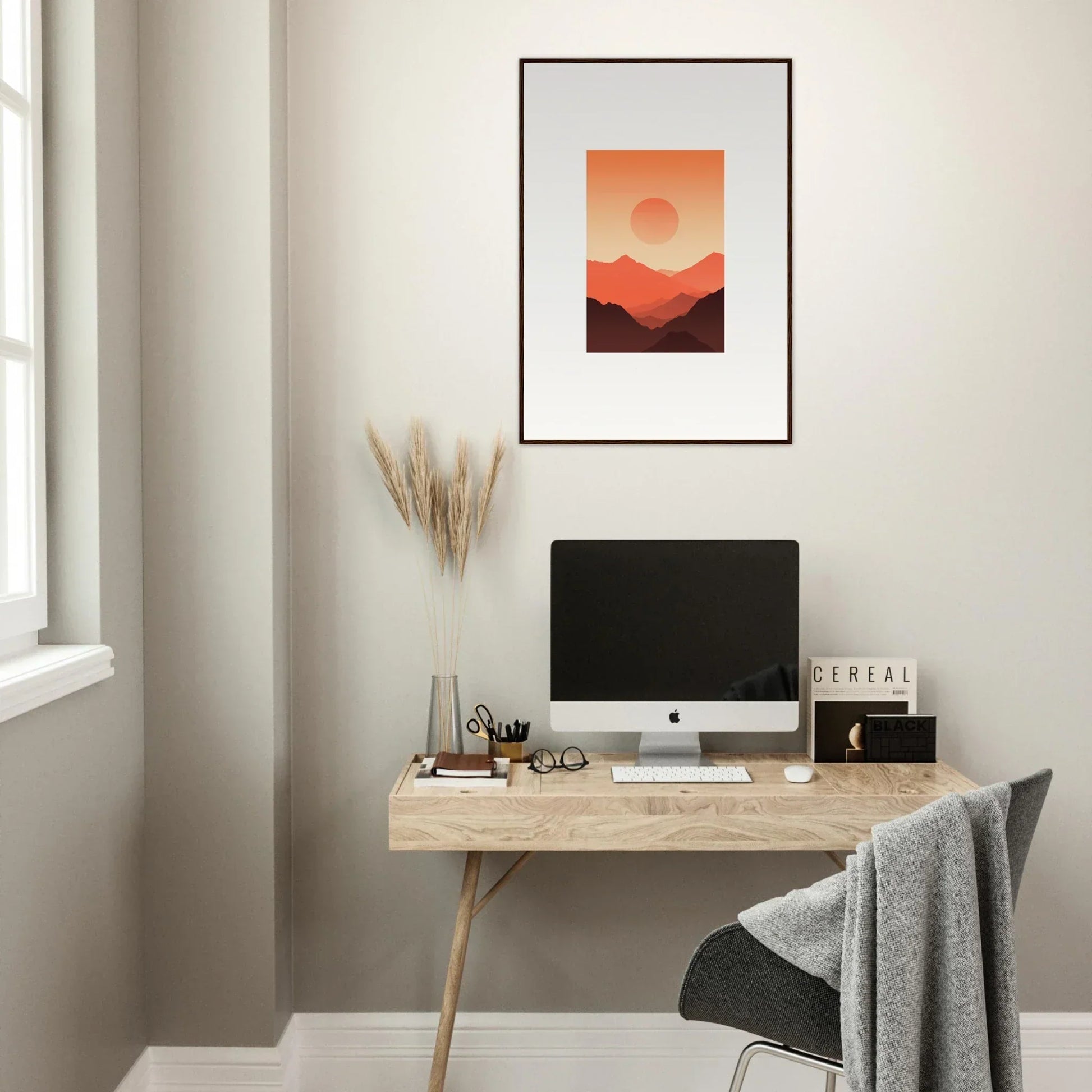 Minimalist home office with wooden desk, computer, and framed wall art for Monarch Glow room decor