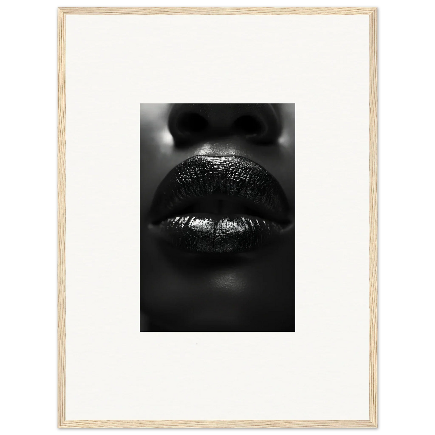 Close-up black and white photo of glossy lips perfect for liquid kisses canvas print