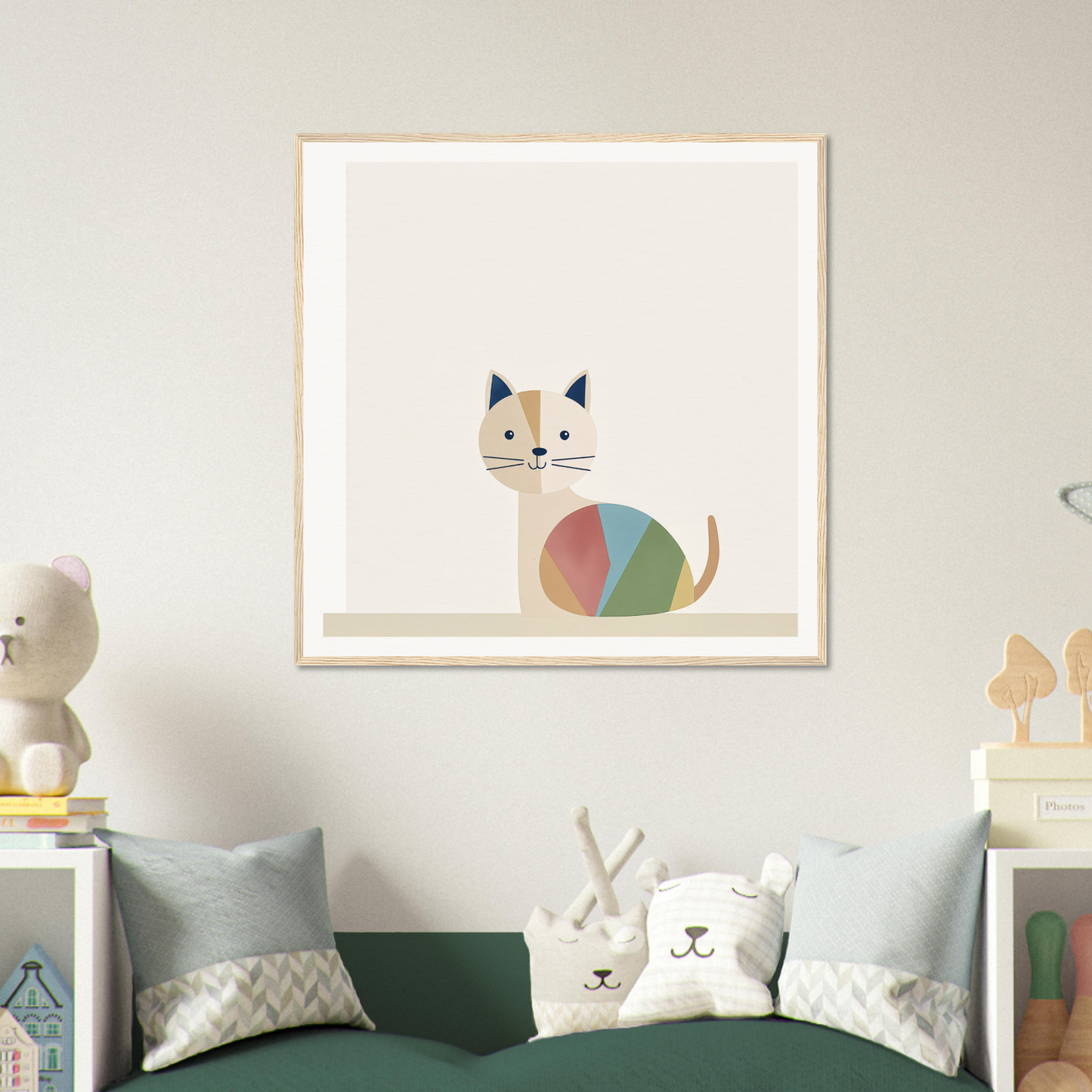 Simple cartoon cat artwork with a colorful geometric body from Curious Cat Balances