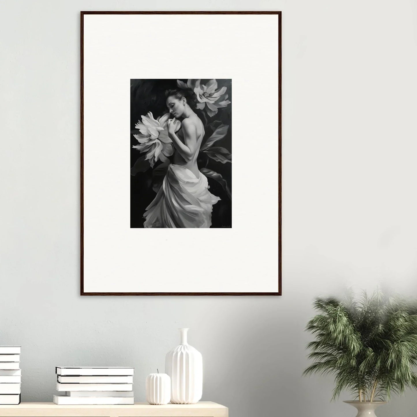 Framed black and white photo of a woman holding flowers, part of Delicate Midnight Reverie