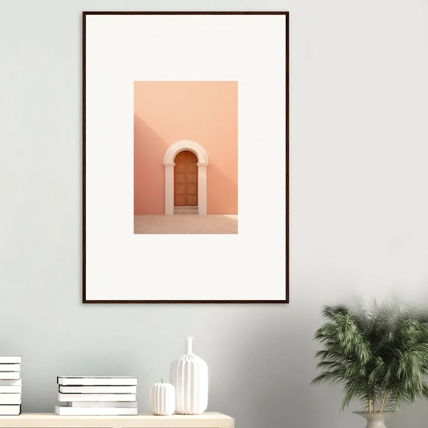 Framed wall art of a wooden door in a pink arched doorway, Dream Portal Solace design