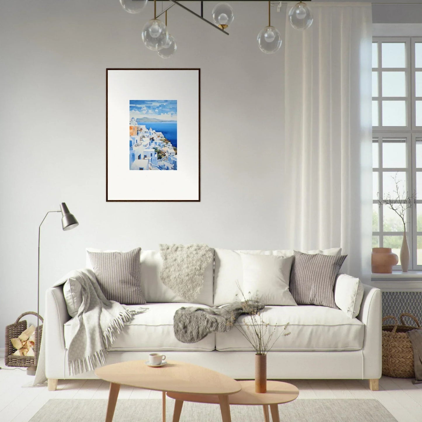 White sofa with gray and cream pillows, complementing Dreamscape Blue Reflections art