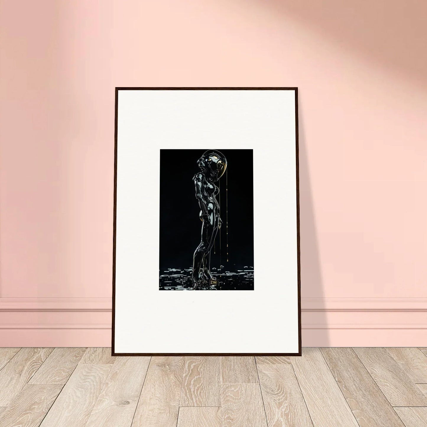 Framed black and white artwork depicting a nude figure with water cascading over their body.