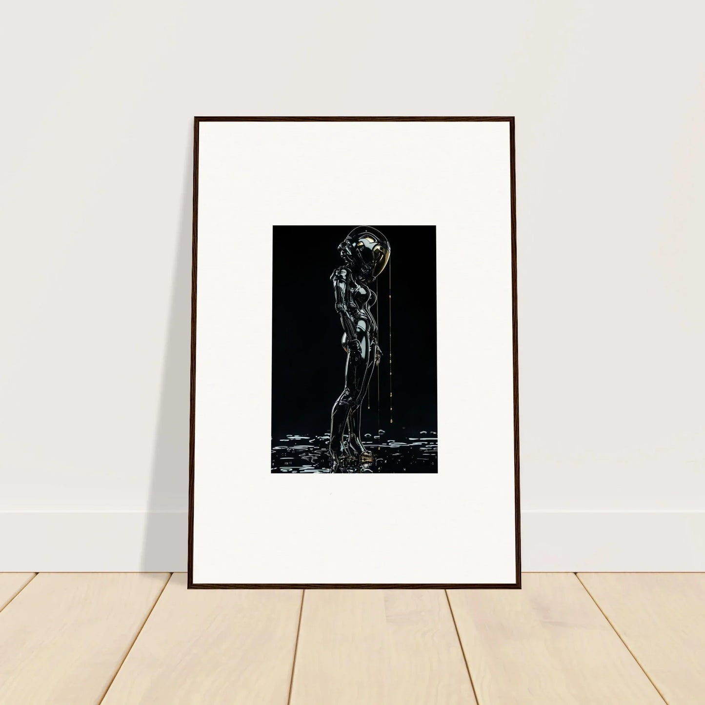 Framed black and white artwork depicting a nude figure with water pouring over their body.