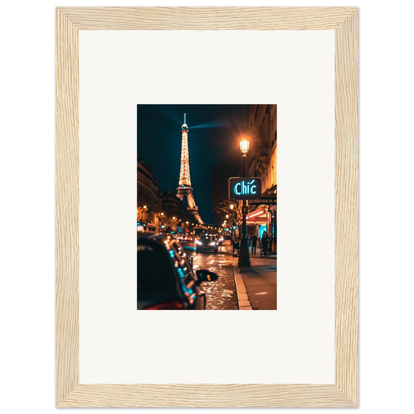 Framed wall art of a Paris street at night with the lit Eiffel Tower for room decoration