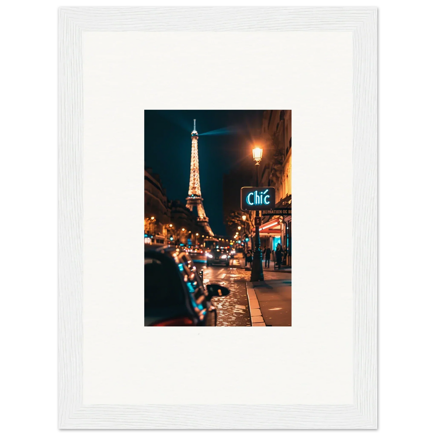 Framed canvas print of a Parisian street scene with the glowing Eiffel Tower for room decoration