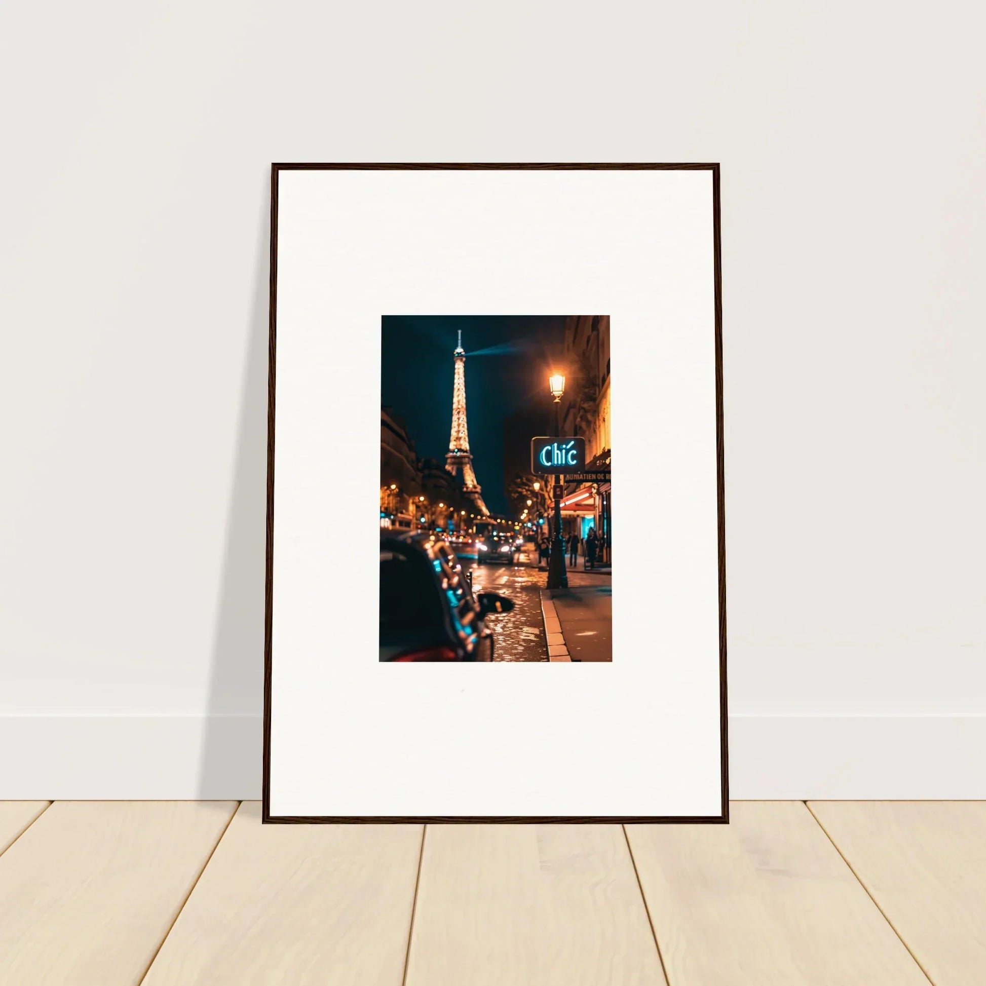 Framed wall art of a Paris street at night with the glowing Eiffel Tower for room decoration