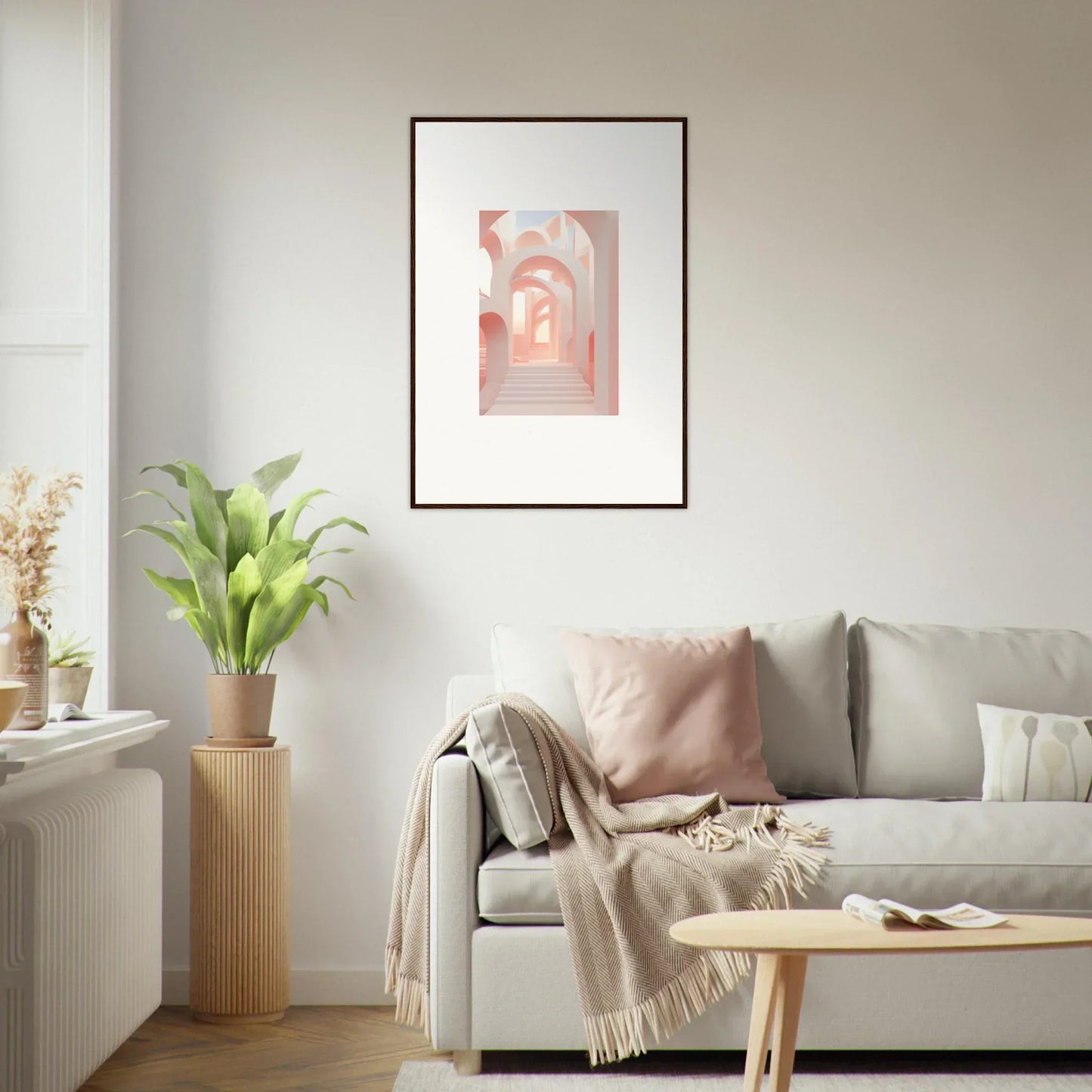 Framed artwork depicting arched passageways in soft pink tones.
