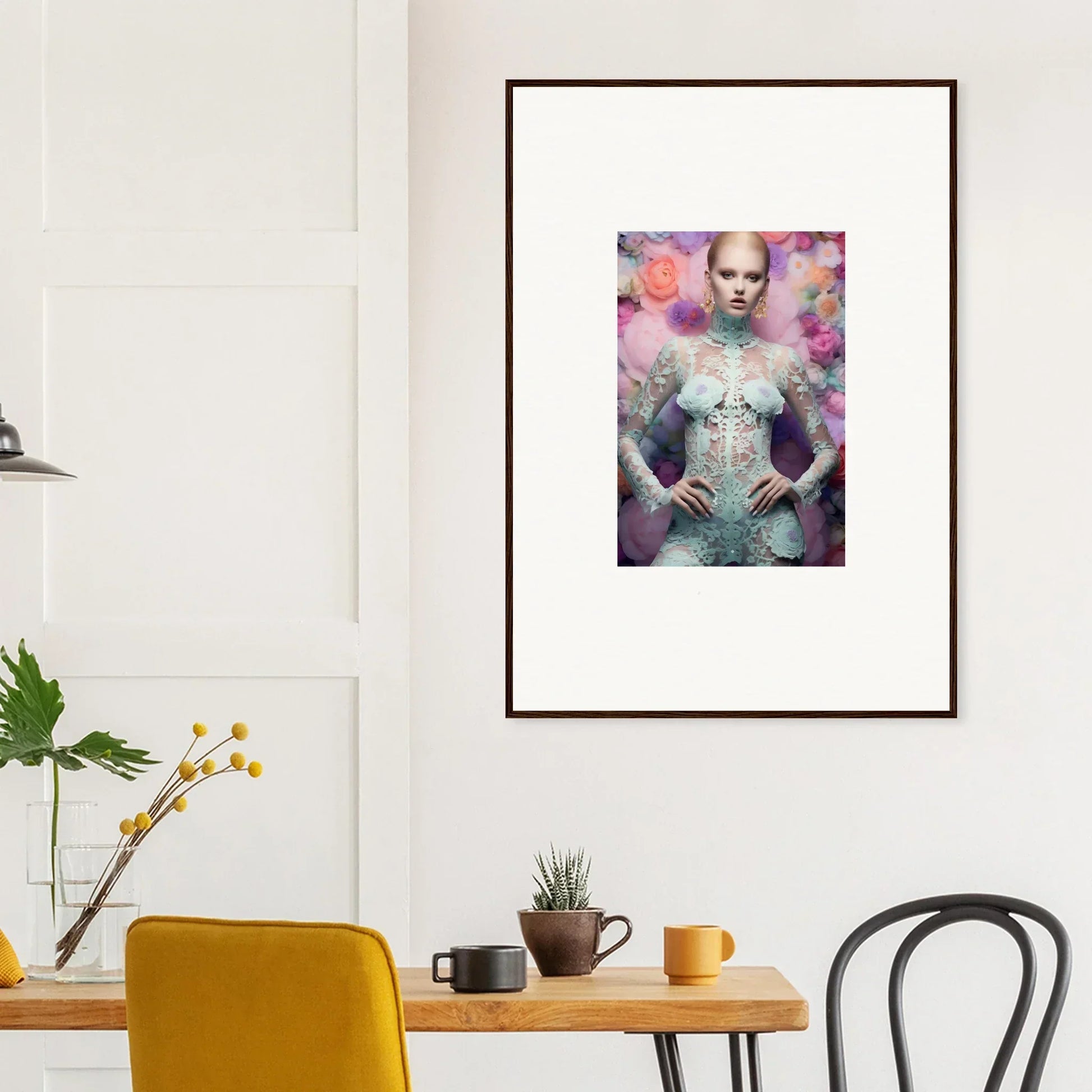 Framed artwork depicting a figure in an ornate outfit against a colorful, ethereal background.