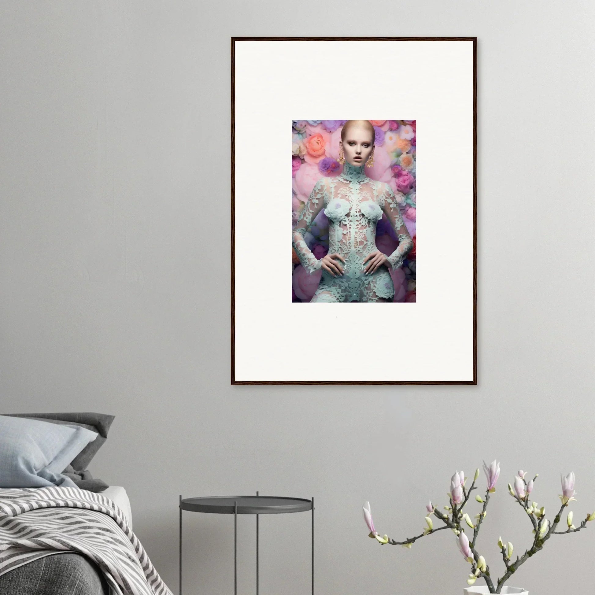 Framed artwork depicting a surreal, ethereal figure with pale skin against a colorful, dreamy background.