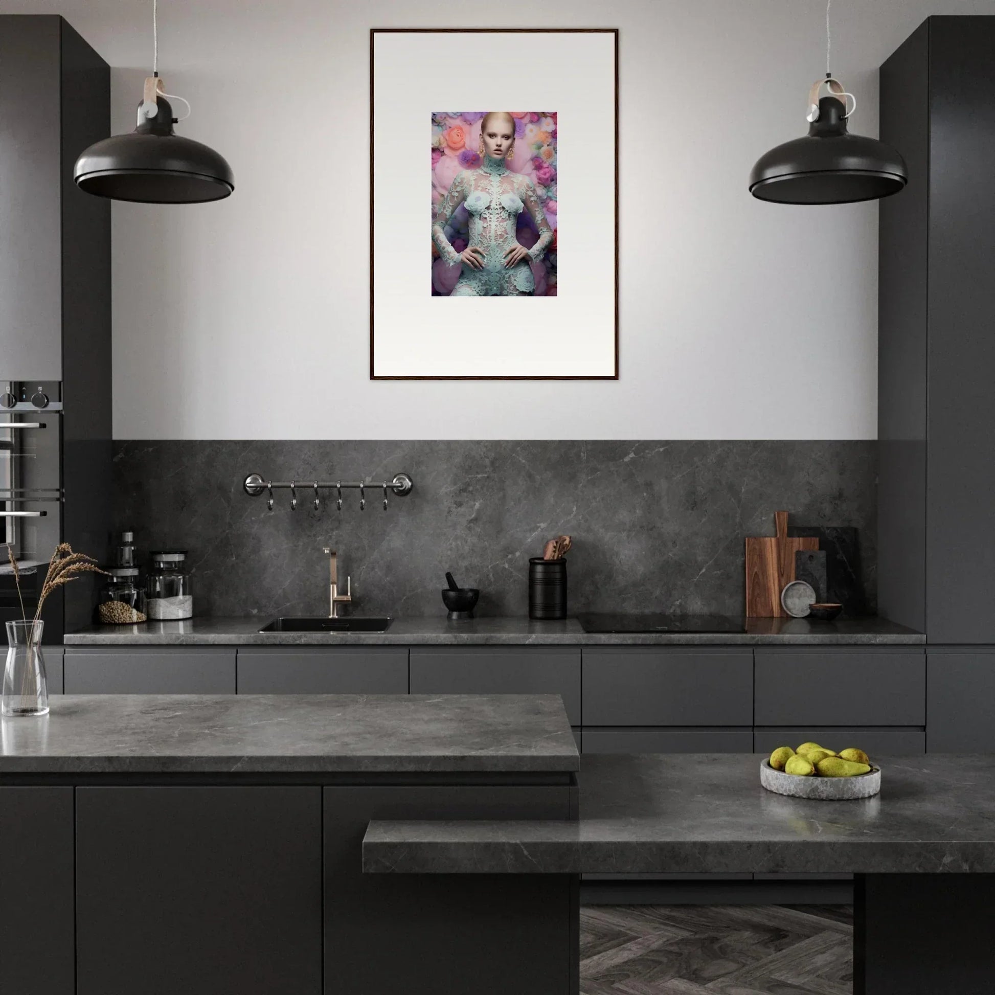 Modern kitchen with dark cabinetry, pendant lights, and colorful framed artwork on the wall.