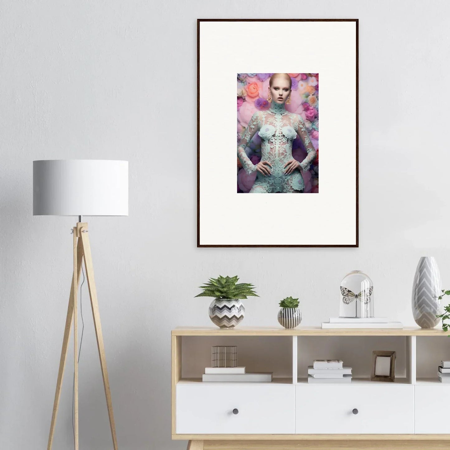 Framed artistic portrait featuring a figure surrounded by colorful floral elements.
