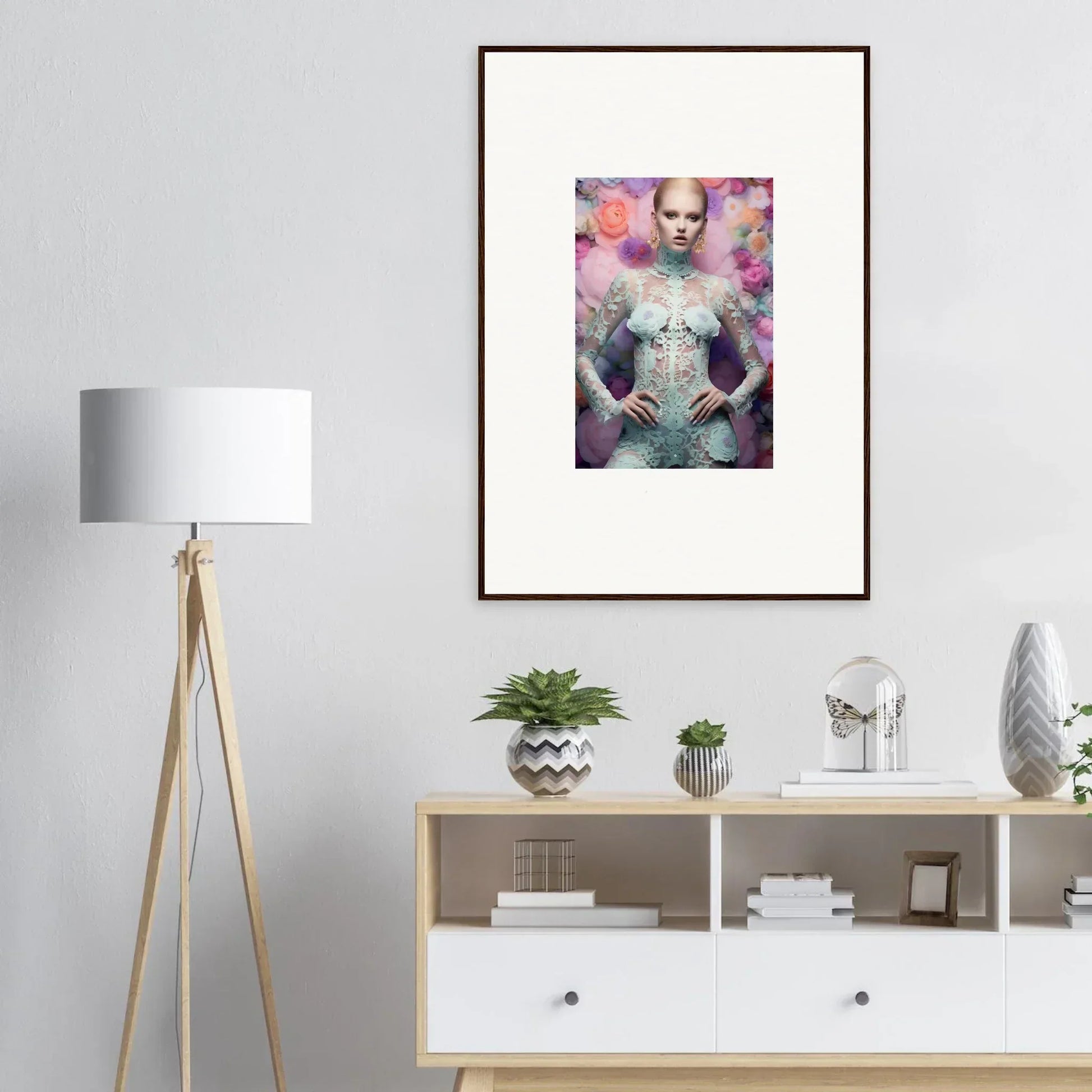 Framed artistic portrait featuring a figure surrounded by colorful floral elements.