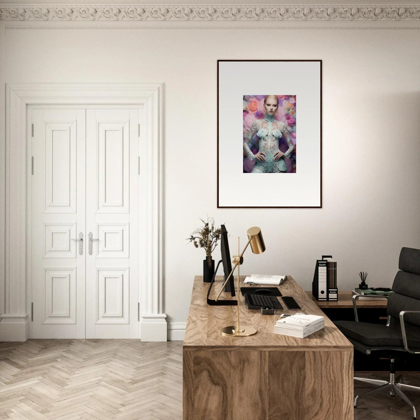 Elegant home office workspace with a wooden desk and framed artwork.