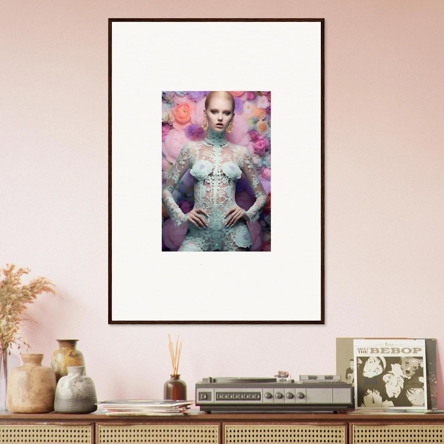 Framed portrait of a figure in an ornate, jeweled outfit surrounded by colorful, ethereal effects.