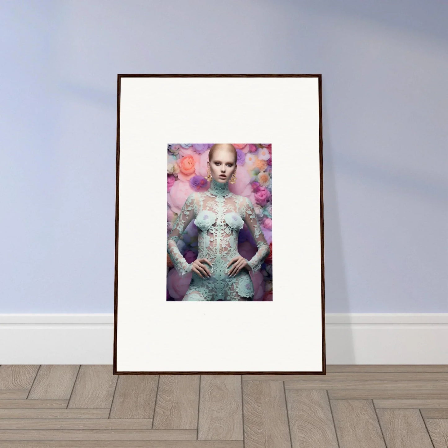 Framed artwork depicting a figure in an ornate, floral-themed fantasy portrait.