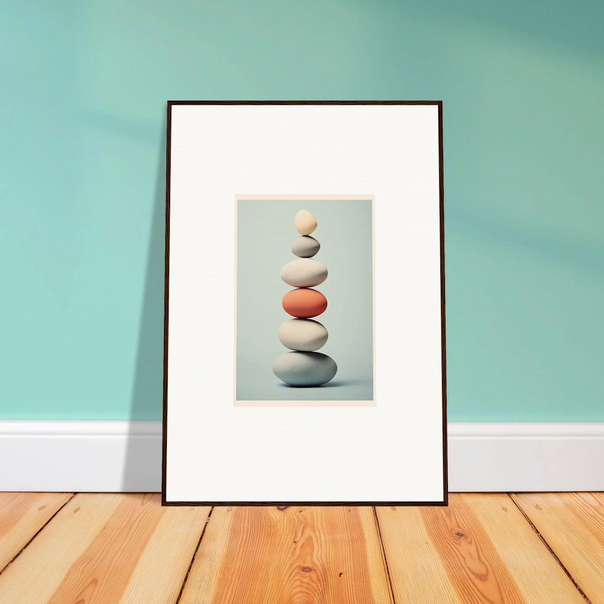 Framed Egg Wanders Reverie artwork of balanced stones stacked in a cairn formation