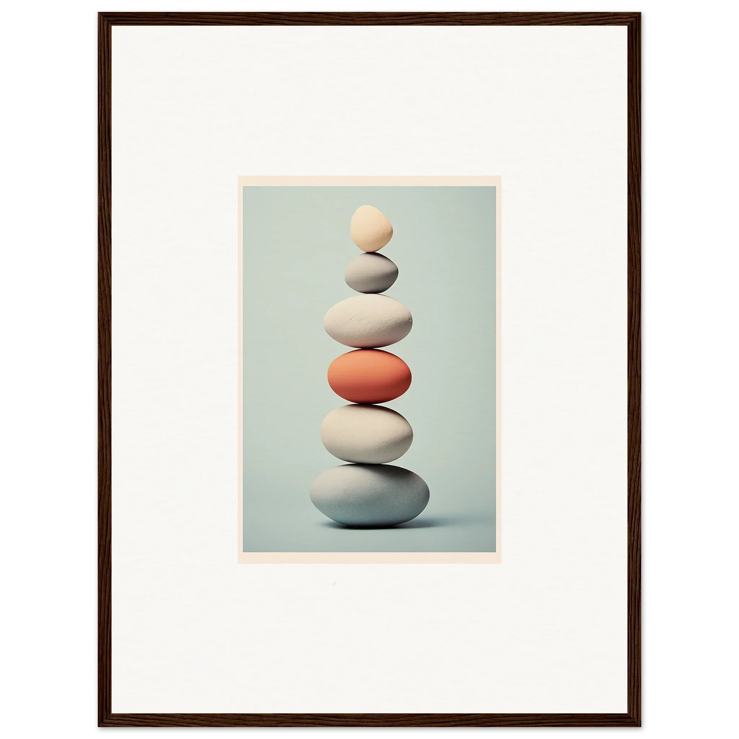 Balanced stones with a coral accent in Egg Wanders Reverie premium framed wall art