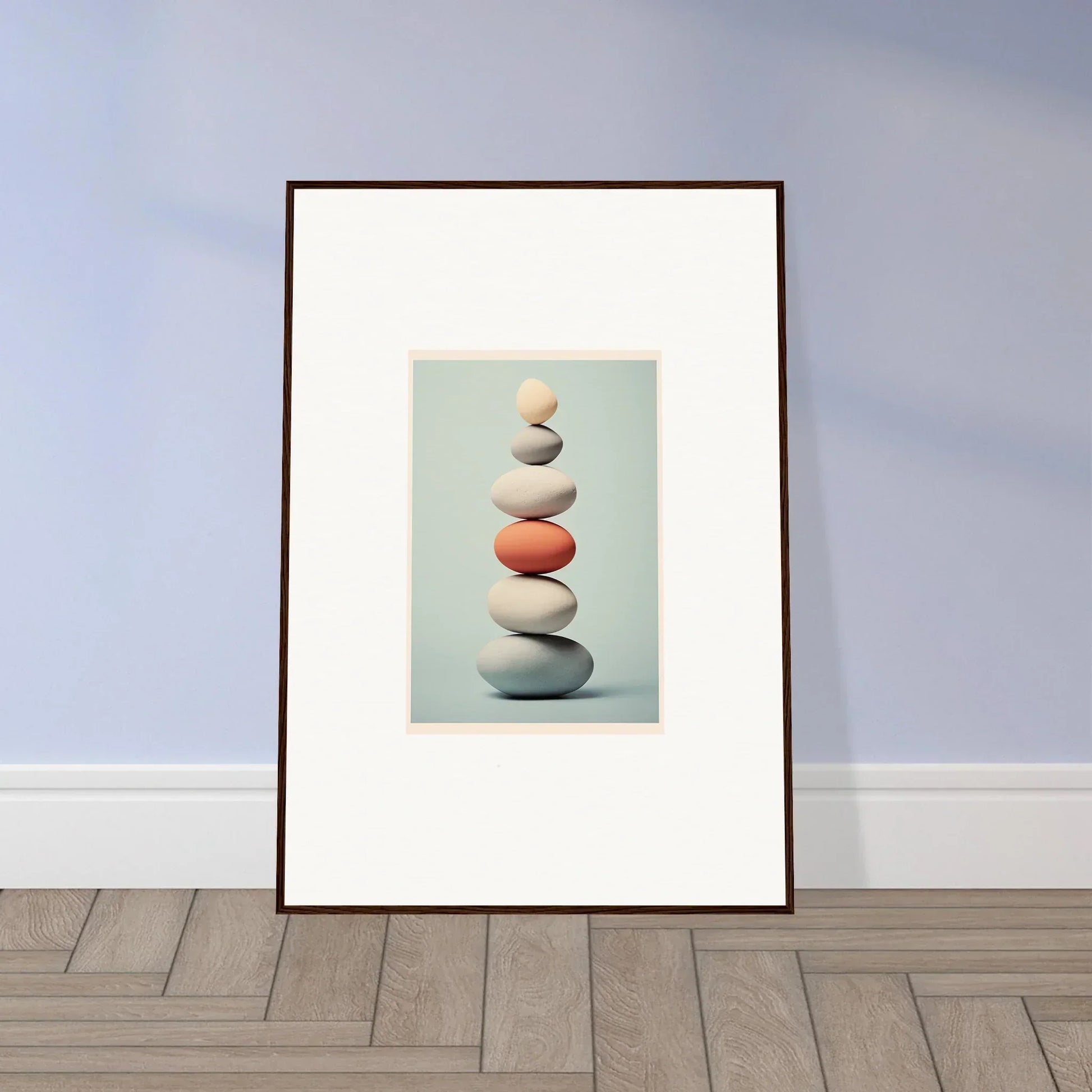 Framed art print of balanced stones with orange rock in Egg Wanders Reverie