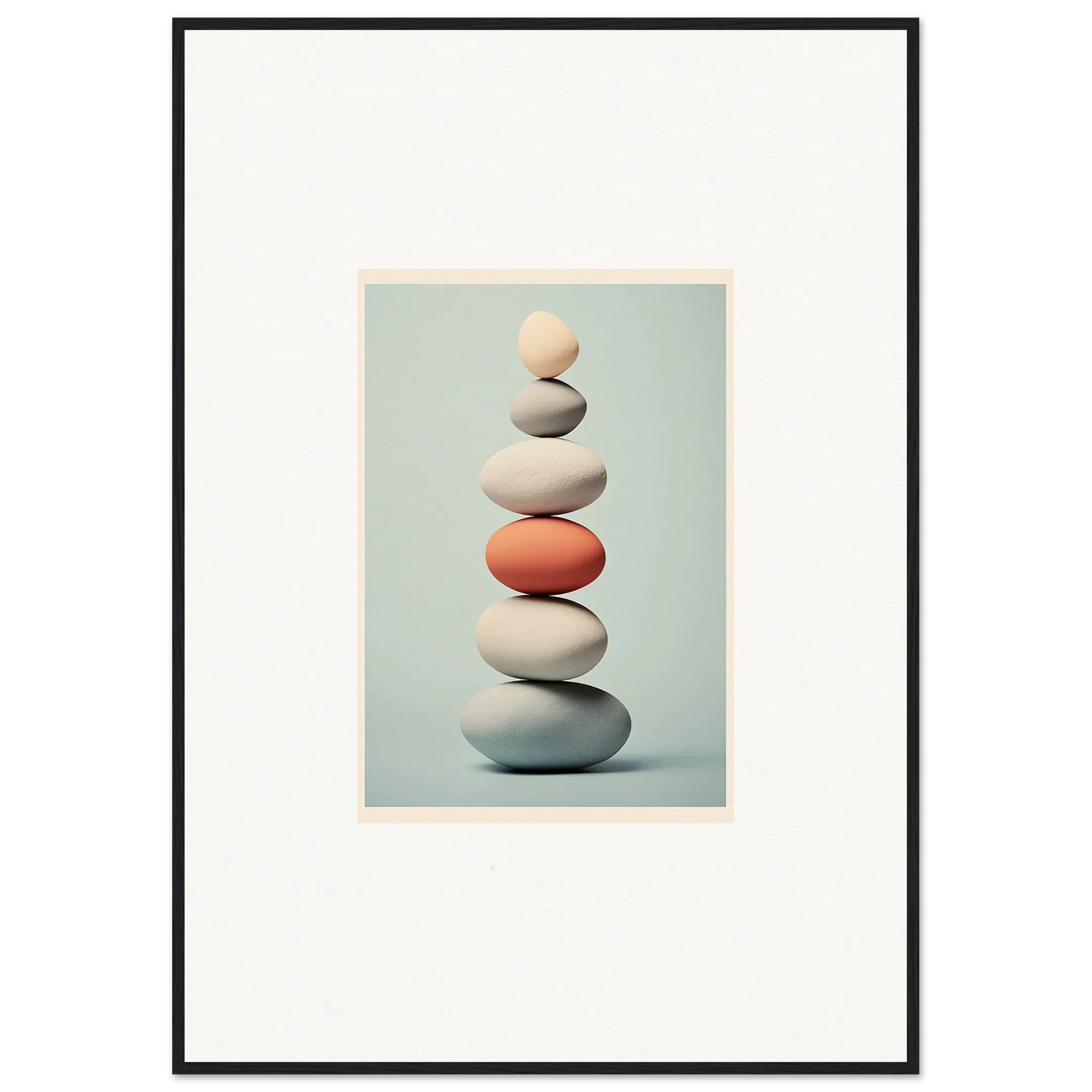 Balanced smooth stones with a coral stone in the center from Egg Wanders Reverie