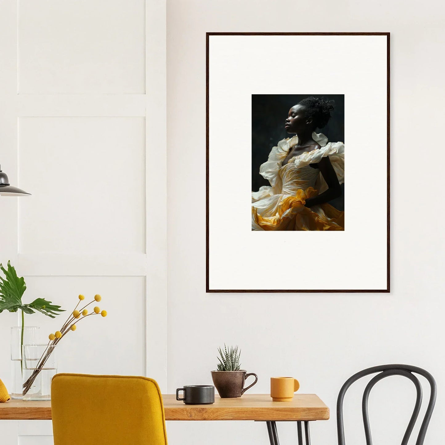 Framed wall art of a person in an expressive pose, perfect for Whisper Alight room decor