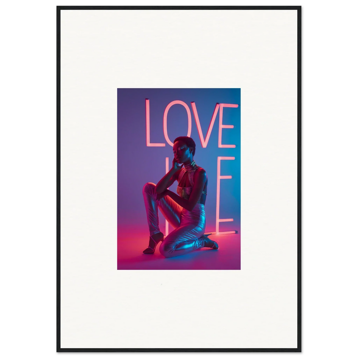 Framed canvas print of neon rapture ’LOVE’ sign with silhouette, perfect room decoration