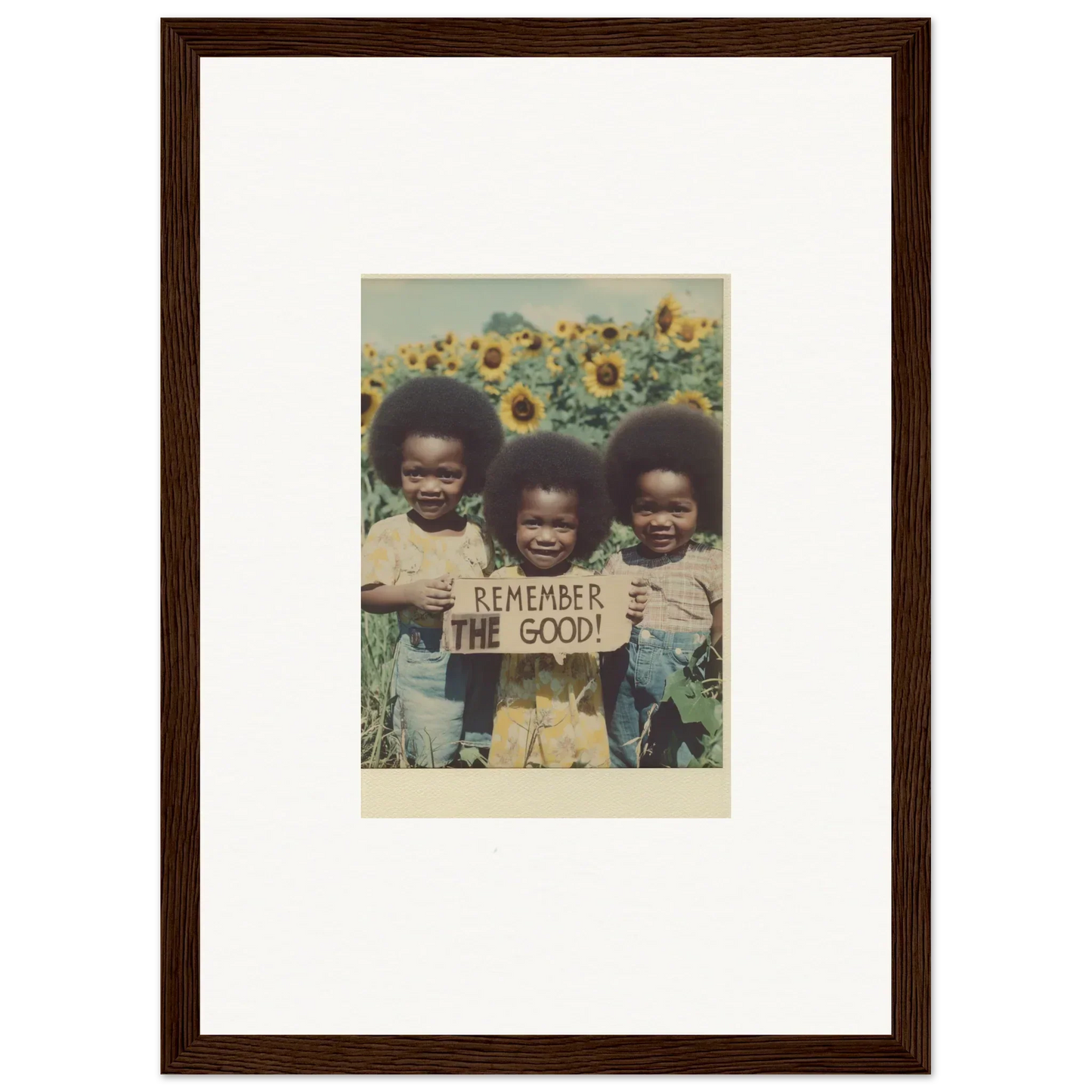 Framed vintage photo of kids with Remember the Good sign in sunflower field for bloom moments