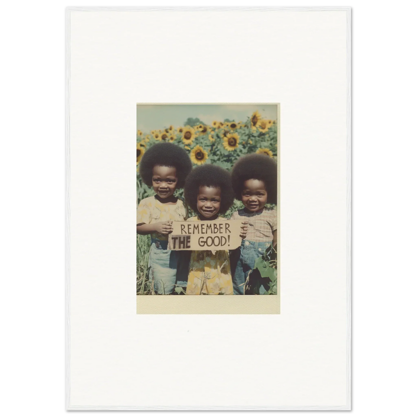 Vintage kids in sunflower field holding a sign for bloom moments canvas print