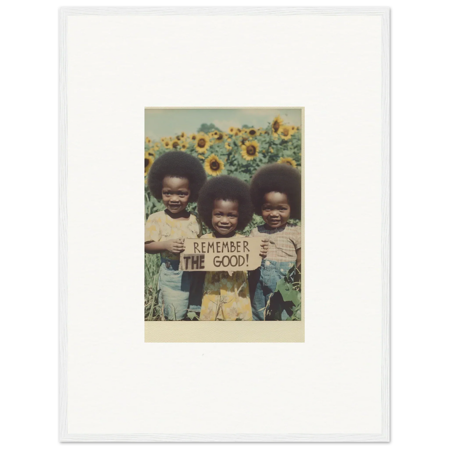 Framed photo of kids with Remember the Good sign in a sunflower field for bloom moments