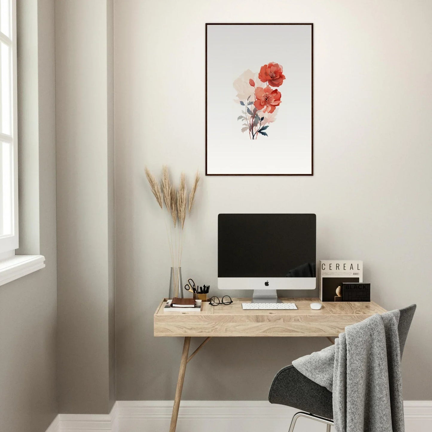 Minimalist workspace featuring a wooden desk, computer, and dreamy Dreamscape Flora canvas print