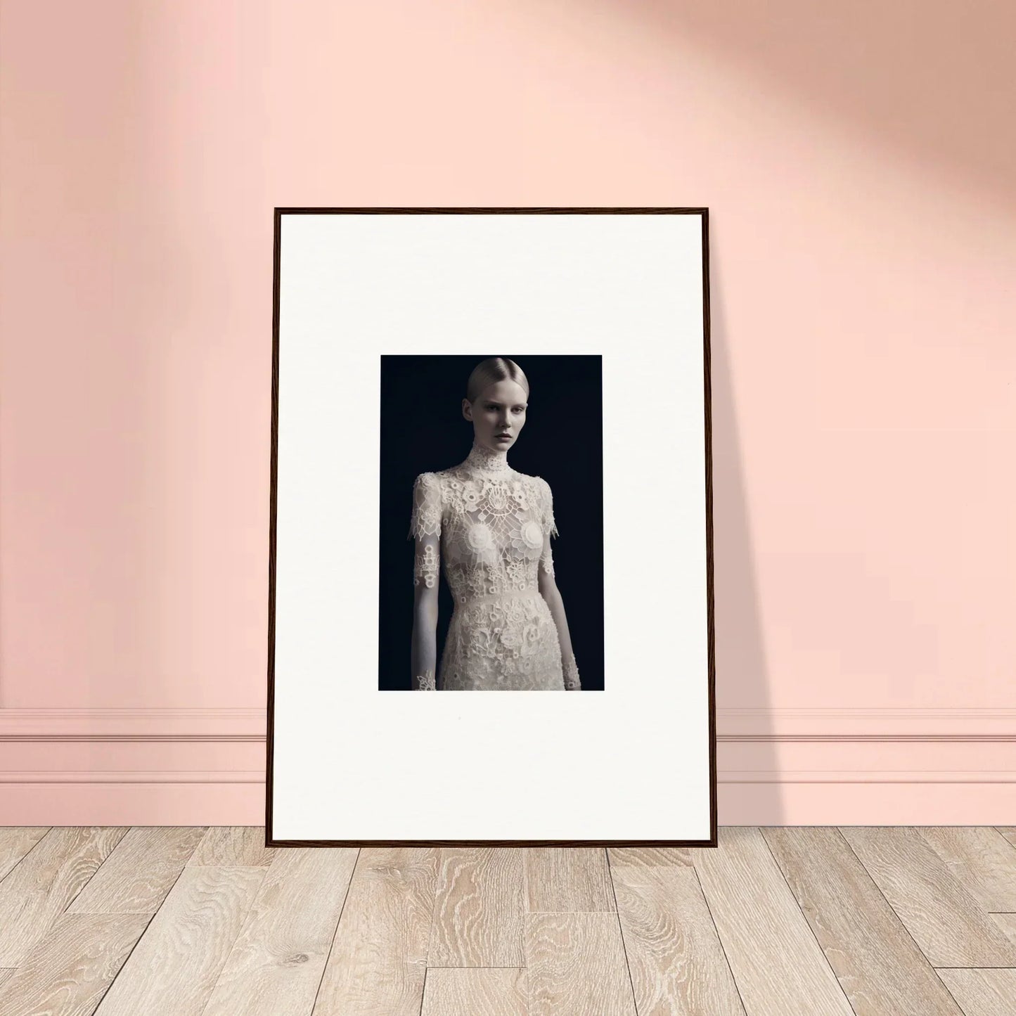 Framed black and white wall art of a person in an ornate lace dress for Marble Dreams room decor