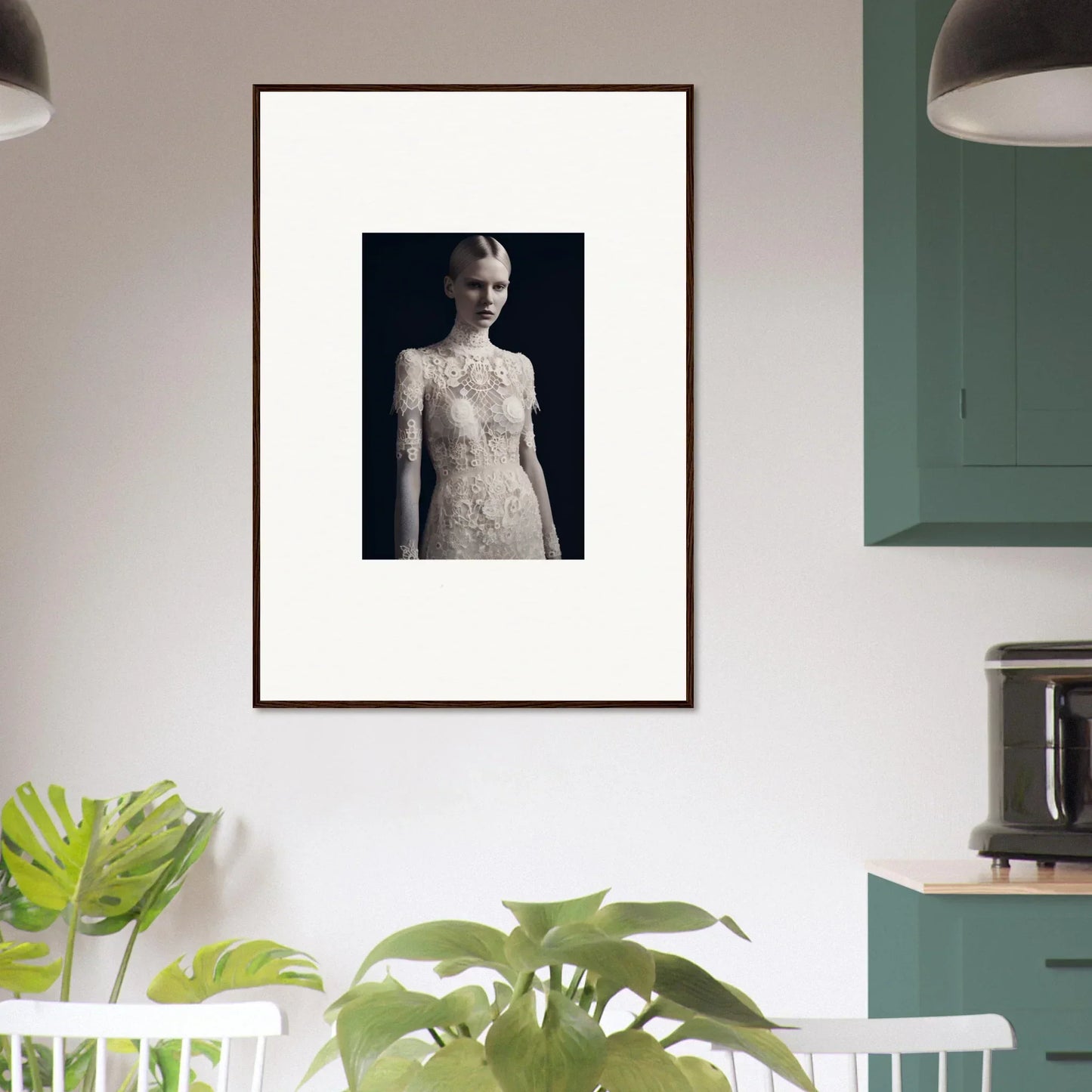 Framed black and white photograph of a person in an intricate lace dress for room decor